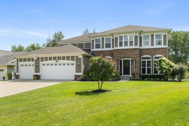 Stunning home in the highly sought-after Macatawa Legends on The Macatwa Legends Golf Course in Michigan - for sale on GolfHomes.com, golf home, golf lot