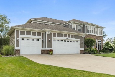 Stunning home in the highly sought-after Macatawa Legends on The Macatwa Legends Golf Course in Michigan - for sale on GolfHomes.com, golf home, golf lot