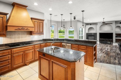 Welcome to 203 Landings Drive, a spacious 5-bedroom, 3-bathroom on Nature Walk Golf Course in Florida - for sale on GolfHomes.com, golf home, golf lot