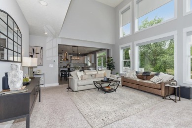 Stunning home in the highly sought-after Macatawa Legends on The Macatwa Legends Golf Course in Michigan - for sale on GolfHomes.com, golf home, golf lot