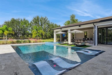 Set within the exclusive guard gated community of Bella Collina on Bella Collina Golf Club in Florida - for sale on GolfHomes.com, golf home, golf lot