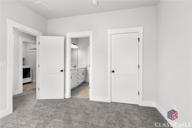 Experience Luxury Living in This Beautiful Craftsman Home! on Traditions of Braselton Golf Club in Georgia - for sale on GolfHomes.com, golf home, golf lot
