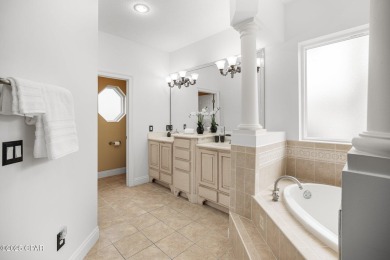 Welcome to 203 Landings Drive, a spacious 5-bedroom, 3-bathroom on Nature Walk Golf Course in Florida - for sale on GolfHomes.com, golf home, golf lot