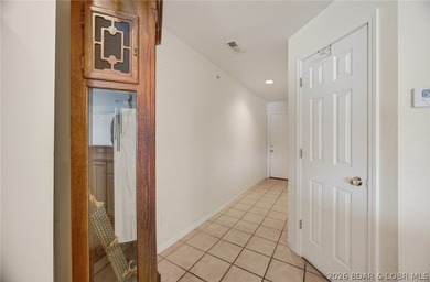 Waterfront walk-in unit with just a few steps at Cedar Heights on The Club At Old Kinderhook in Missouri - for sale on GolfHomes.com, golf home, golf lot