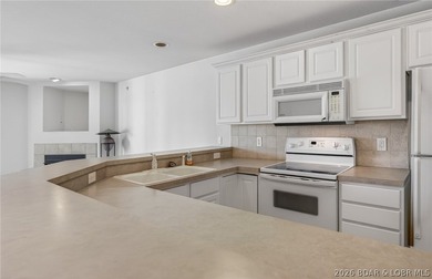 Waterfront walk-in unit with just a few steps at Cedar Heights on The Club At Old Kinderhook in Missouri - for sale on GolfHomes.com, golf home, golf lot