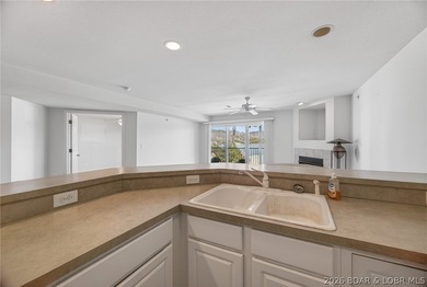 Waterfront walk-in unit with just a few steps at Cedar Heights on The Club At Old Kinderhook in Missouri - for sale on GolfHomes.com, golf home, golf lot