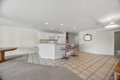 Waterfront walk-in unit with just a few steps at Cedar Heights on The Club At Old Kinderhook in Missouri - for sale on GolfHomes.com, golf home, golf lot