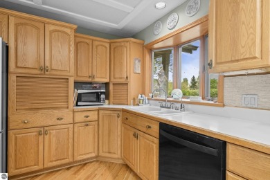 Beautiful 3-bedroom, 2.5-bath ranch home located on the 14th on Grand Traverse Resort and Spa in Michigan - for sale on GolfHomes.com, golf home, golf lot