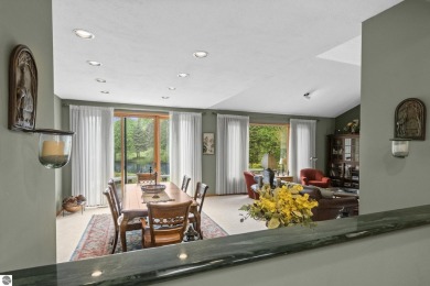 Beautiful 3-bedroom, 2.5-bath ranch home located on the 14th on Grand Traverse Resort and Spa in Michigan - for sale on GolfHomes.com, golf home, golf lot