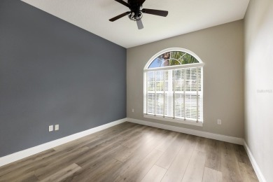 Step inside this classy 3 bedroom 2 bath home with views of the on Stoneybrook Golf Club At Heritage Harbour in Florida - for sale on GolfHomes.com, golf home, golf lot