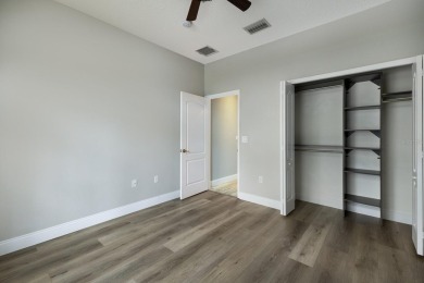 Step inside this classy 3 bedroom 2 bath home with views of the on Stoneybrook Golf Club At Heritage Harbour in Florida - for sale on GolfHomes.com, golf home, golf lot