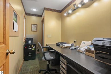 Beautiful 3-bedroom, 2.5-bath ranch home located on the 14th on Grand Traverse Resort and Spa in Michigan - for sale on GolfHomes.com, golf home, golf lot