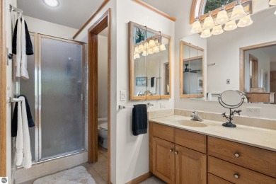 Beautiful 3-bedroom, 2.5-bath ranch home located on the 14th on Grand Traverse Resort and Spa in Michigan - for sale on GolfHomes.com, golf home, golf lot