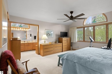 Beautiful 3-bedroom, 2.5-bath ranch home located on the 14th on Grand Traverse Resort and Spa in Michigan - for sale on GolfHomes.com, golf home, golf lot