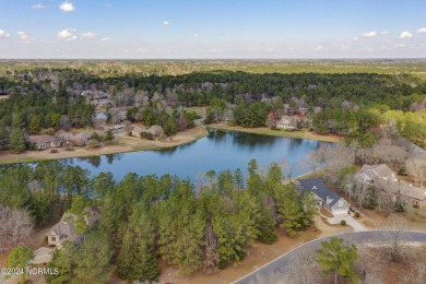 Discover a haven of tranquility on this beautiful pond-front on River Landing Golf Course in North Carolina - for sale on GolfHomes.com, golf home, golf lot