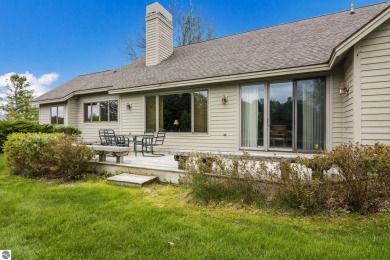 Beautiful 3-bedroom, 2.5-bath ranch home located on the 14th on Grand Traverse Resort and Spa in Michigan - for sale on GolfHomes.com, golf home, golf lot