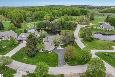 Beautiful 3-bedroom, 2.5-bath ranch home located on the 14th on Grand Traverse Resort and Spa in Michigan - for sale on GolfHomes.com, golf home, golf lot