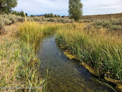 This beautiful 3.45 acre building site in the Owl Creek on Jackson Hole Golf and Tennis Club in Wyoming - for sale on GolfHomes.com, golf home, golf lot