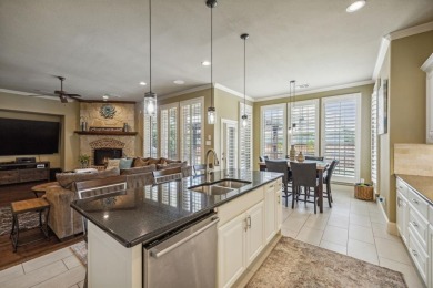 Immerse in the charm of this two-story Lantana home nestled in on Lantana Golf Club in Texas - for sale on GolfHomes.com, golf home, golf lot