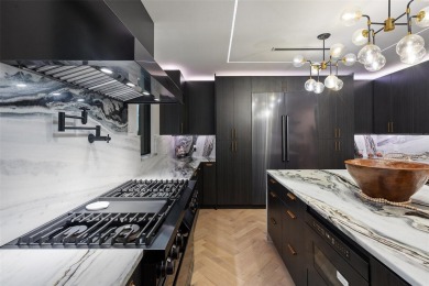 Bold, sophisticated, and move-in ready -- this natural modern on Austin Country Club in Texas - for sale on GolfHomes.com, golf home, golf lot