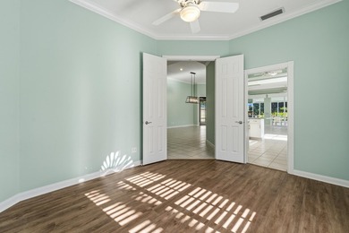 Exceptional 3-bedroom plus office residence located in the gated on Lost Lake Golf Club in Florida - for sale on GolfHomes.com, golf home, golf lot