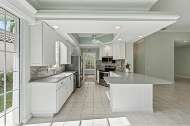 Exceptional 3-bedroom plus office residence located in the gated on Lost Lake Golf Club in Florida - for sale on GolfHomes.com, golf home, golf lot