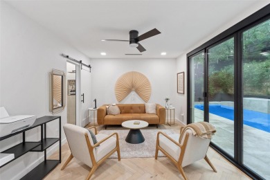Bold, sophisticated, and move-in ready -- this natural modern on Austin Country Club in Texas - for sale on GolfHomes.com, golf home, golf lot