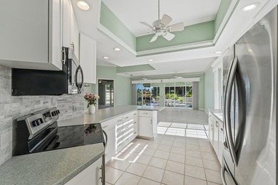 Exceptional 3-bedroom plus office residence located in the gated on Lost Lake Golf Club in Florida - for sale on GolfHomes.com, golf home, golf lot