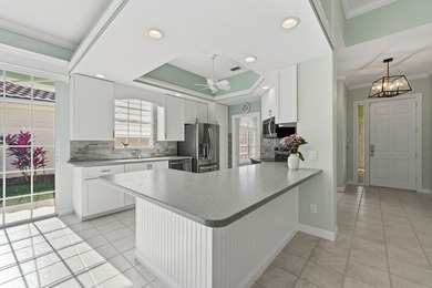 Exceptional 3-bedroom plus office residence located in the gated on Lost Lake Golf Club in Florida - for sale on GolfHomes.com, golf home, golf lot