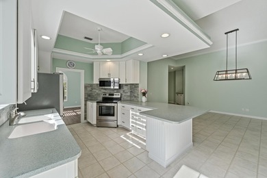 Exceptional 3-bedroom plus office residence located in the gated on Lost Lake Golf Club in Florida - for sale on GolfHomes.com, golf home, golf lot