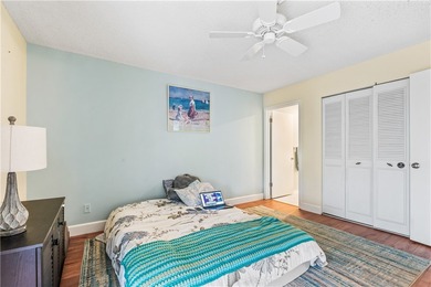 Enjoy easy Florida living in this 2BR/2BA FIRST-FLOOR unit with on The American Golf Club in Florida - for sale on GolfHomes.com, golf home, golf lot