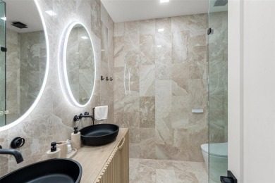 Bold, sophisticated, and move-in ready -- this natural modern on Austin Country Club in Texas - for sale on GolfHomes.com, golf home, golf lot