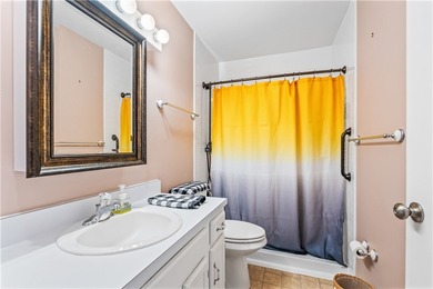 Enjoy easy Florida living in this 2BR/2BA FIRST-FLOOR unit with on The American Golf Club in Florida - for sale on GolfHomes.com, golf home, golf lot