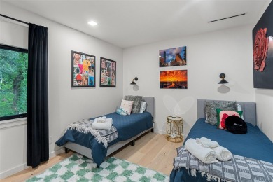 Bold, sophisticated, and move-in ready -- this natural modern on Austin Country Club in Texas - for sale on GolfHomes.com, golf home, golf lot