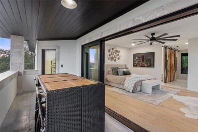 Bold, sophisticated, and move-in ready -- this natural modern on Austin Country Club in Texas - for sale on GolfHomes.com, golf home, golf lot