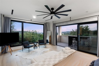 Bold, sophisticated, and move-in ready -- this natural modern on Austin Country Club in Texas - for sale on GolfHomes.com, golf home, golf lot