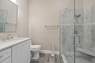 Exceptional 3-bedroom plus office residence located in the gated on Lost Lake Golf Club in Florida - for sale on GolfHomes.com, golf home, golf lot