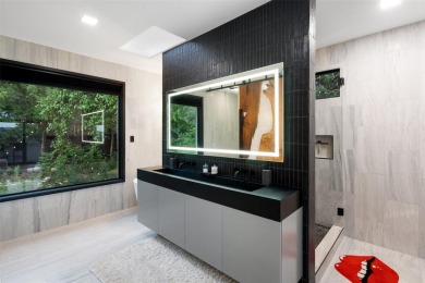 Bold, sophisticated, and move-in ready -- this natural modern on Austin Country Club in Texas - for sale on GolfHomes.com, golf home, golf lot