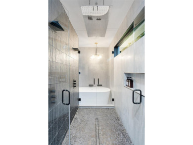 Bold, sophisticated, and move-in ready -- this natural modern on Austin Country Club in Texas - for sale on GolfHomes.com, golf home, golf lot