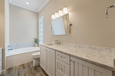 Exceptional 3-bedroom plus office residence located in the gated on Lost Lake Golf Club in Florida - for sale on GolfHomes.com, golf home, golf lot