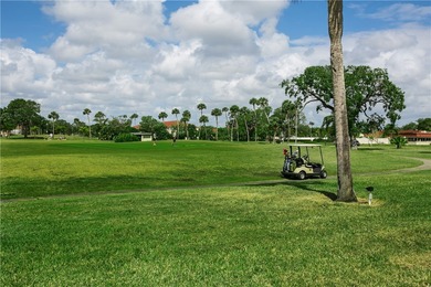 Enjoy easy Florida living in this 2BR/2BA FIRST-FLOOR unit with on The American Golf Club in Florida - for sale on GolfHomes.com, golf home, golf lot