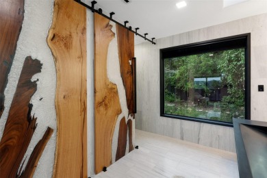 Bold, sophisticated, and move-in ready -- this natural modern on Austin Country Club in Texas - for sale on GolfHomes.com, golf home, golf lot