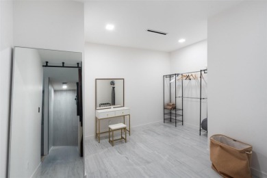Bold, sophisticated, and move-in ready -- this natural modern on Austin Country Club in Texas - for sale on GolfHomes.com, golf home, golf lot