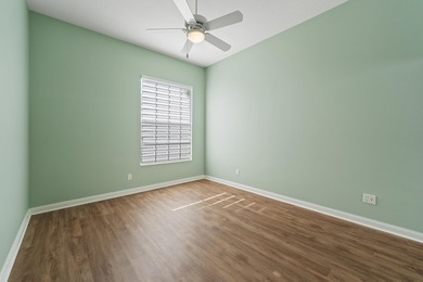 Exceptional 3-bedroom plus office residence located in the gated on Lost Lake Golf Club in Florida - for sale on GolfHomes.com, golf home, golf lot