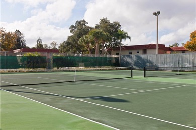 Enjoy easy Florida living in this 2BR/2BA FIRST-FLOOR unit with on The American Golf Club in Florida - for sale on GolfHomes.com, golf home, golf lot