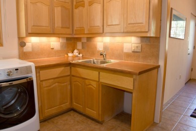 Welcome to this lovely, well-maintained, SW style custom home on Paa-Ko Ridge Golf Club  in New Mexico - for sale on GolfHomes.com, golf home, golf lot
