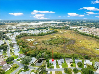 PRICED TO SELL WITH A $14,900 PRICE ADJUSTMENT !!!! Lovely on El Diablo Executive Golf Course in Florida - for sale on GolfHomes.com, golf home, golf lot