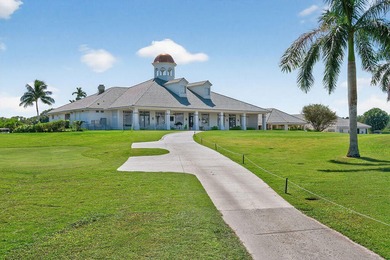 Exceptional 3-bedroom plus office residence located in the gated on Lost Lake Golf Club in Florida - for sale on GolfHomes.com, golf home, golf lot