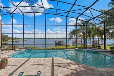 This luxurious estate sits on an amazing lakefront lot on a on Windermere Country Club in Florida - for sale on GolfHomes.com, golf home, golf lot