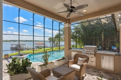 This luxurious estate sits on an amazing lakefront lot on a on Windermere Country Club in Florida - for sale on GolfHomes.com, golf home, golf lot